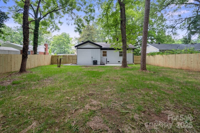 5420 Gwynne Ave, Charlotte, NC 28205 - fenced backyard featuring a patio