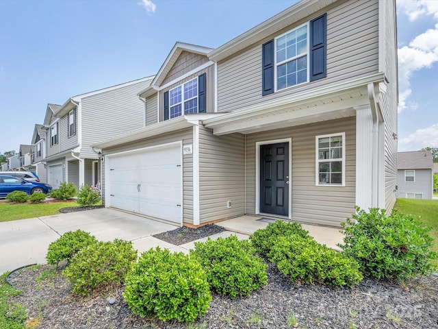 9136 Creedmore Hills Dr, Charlotte, NC 28214 - view of front facade with driveway and a garage