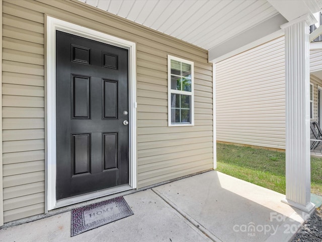 9136 Creedmore Hills Dr, Charlotte, NC 28214 - view of exterior entry featuring a porch
