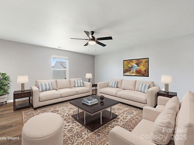 9136 Creedmore Hills Dr, Charlotte, NC 28214 - living area featuring wood finished floors and ceiling fan