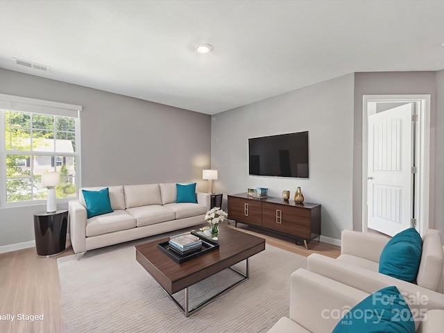 9136 Creedmore Hills Dr, Charlotte, NC 28214 - living room with wood finished floors and baseboards