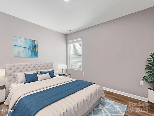 9136 Creedmore Hills Dr, Charlotte, NC 28214 - bedroom featuring wood finished floors and baseboards