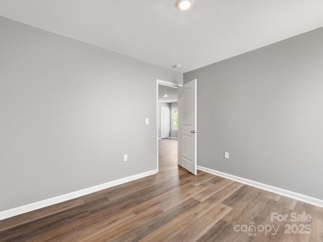 9136 Creedmore Hills Dr, Charlotte, NC 28214 - spare room with wood finished floors and recessed lighting
