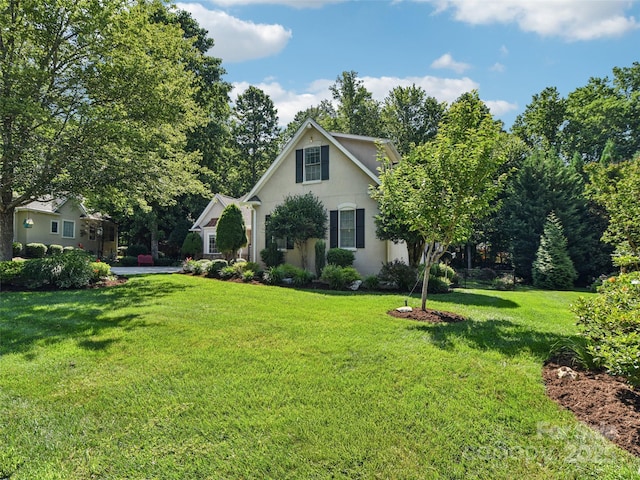 145 Fernbrook Way, Hendersonville, NC 28791 - view of front of home with a front lawn and stucco siding