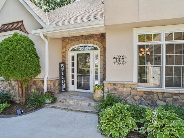 145 Fernbrook Way, Hendersonville, NC 28791 - property entrance with stone siding, a shingled roof, and stucco siding