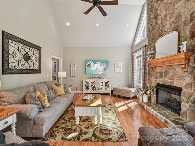 145 Fernbrook Way, Hendersonville, NC 28791 - living room with high vaulted ceiling, wood finished floors, a fireplace, ceiling fan, and recessed lighting