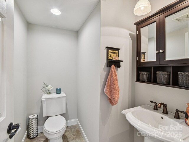 145 Fernbrook Way, Hendersonville, NC 28791 - bathroom with a sink and toilet