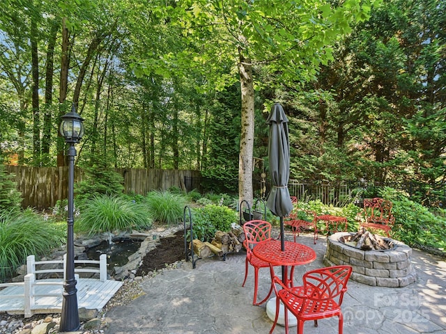145 Fernbrook Way, Hendersonville, NC 28791 - view of patio / terrace featuring a fire pit