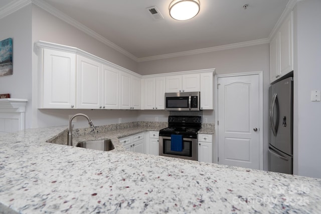 18511 Harborside Dr, Cornelius, NC 28031 - kitchen with appliances with stainless steel finishes, white cabinetry, ornamental molding, and light stone counters