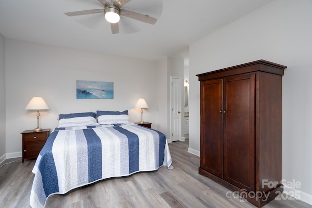 18511 Harborside Dr, Cornelius, NC 28031 - bedroom featuring light wood-type flooring and ceiling fan