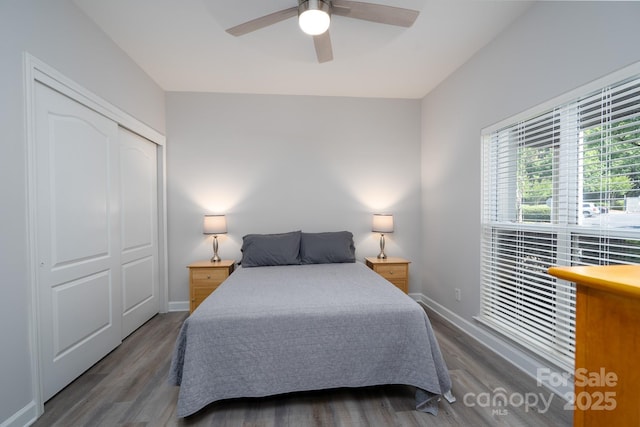 18511 Harborside Dr, Cornelius, NC 28031 - bedroom featuring wood finished floors, a closet, and a ceiling fan