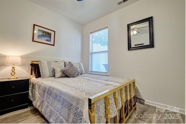 1504 Harpers Inlet Dr, Lake Wylie, SC 29710 - bedroom featuring baseboards and wood finished floors