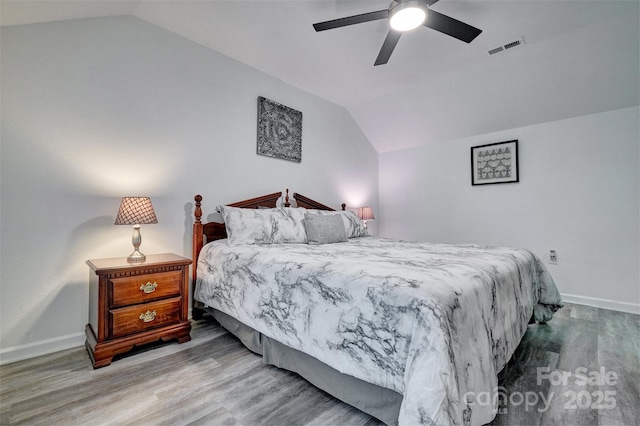 1504 Harpers Inlet Dr, Lake Wylie, SC 29710 - bedroom with vaulted ceiling, wood finished floors, and ceiling fan