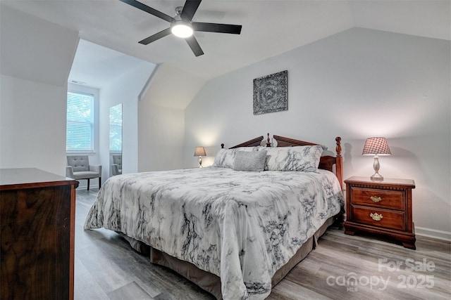 1504 Harpers Inlet Dr, Lake Wylie, SC 29710 - bedroom with lofted ceiling, wood finished floors, and ceiling fan