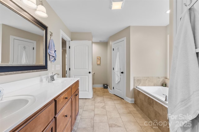 121 Maplewood Ct, Hudson, NC 28638 - bathroom featuring double vanity and a garden tub
