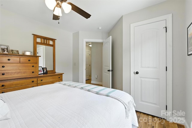 121 Maplewood Ct, Hudson, NC 28638 - bedroom with light wood-style floors and ceiling fan