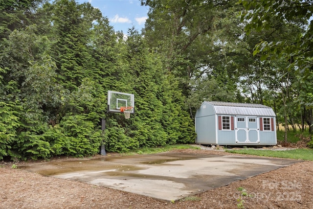 121 Maplewood Ct, Hudson, NC 28638 - view of patio with a storage unit