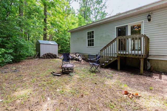 16 Rusty Clay Rdg, Fairview, NC 28730 - view of yard with a storage unit and a fire pit