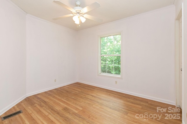 16 Rusty Clay Rdg, Fairview, NC 28730 - spare room with light wood-style flooring, crown molding, and ceiling fan