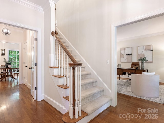 10333 Scott Gate Ct, Charlotte, NC 28277 - staircase with crown molding and wood finished floors