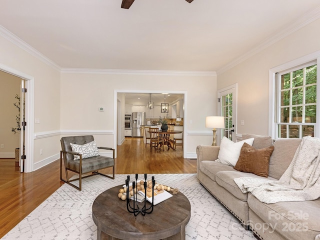 10333 Scott Gate Ct, Charlotte, NC 28277 - living area with wood finished floors, ornamental molding, and ceiling fan