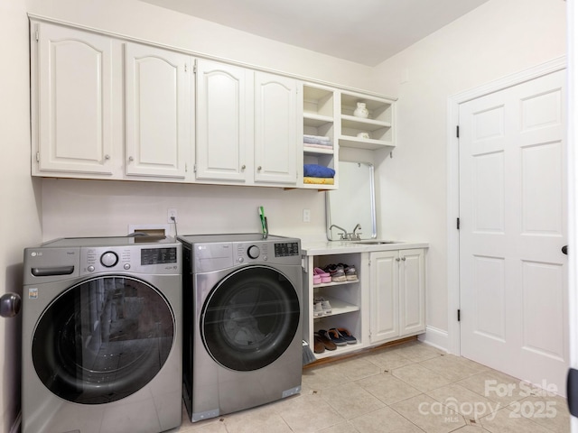 10333 Scott Gate Ct, Charlotte, NC 28277 - laundry area featuring cabinet space, separate washer and dryer, and light tile patterned floors