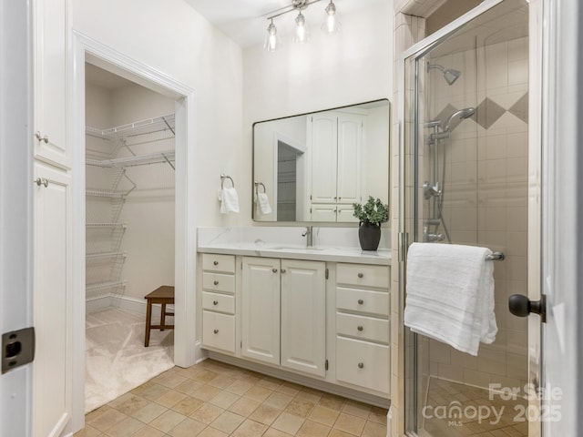 10333 Scott Gate Ct, Charlotte, NC 28277 - full bathroom featuring vanity, a shower stall, and a walk in closet