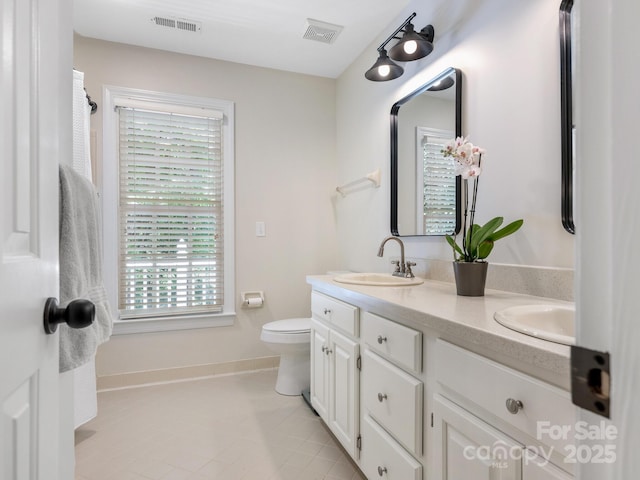 10333 Scott Gate Ct, Charlotte, NC 28277 - full bathroom featuring double vanity and tile patterned floors