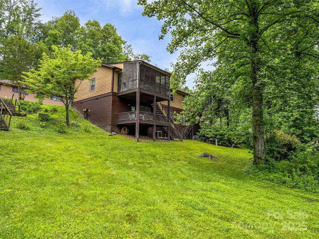 128 View De Lake Dr, Etowah, NC 28729 - back of house featuring stairway, a sunroom, a yard, and a wooden deck