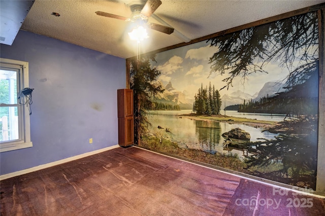 161 Pandora Cir, Canton, NC 28716 - spare room with a textured ceiling, dark carpet, and a ceiling fan