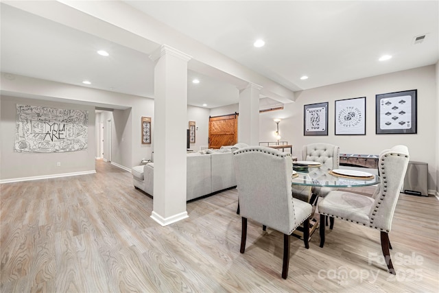 1125 Victoria Blake Ln, Belmont, NC 28012 - dining area with ornate columns, light wood finished floors, and recessed lighting