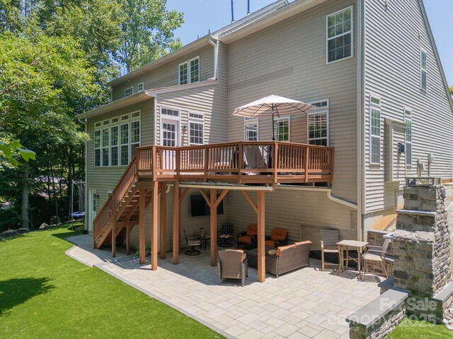 1125 Victoria Blake Ln, Belmont, NC 28012 - back of house featuring a wooden deck, a patio, a lawn, and stairway