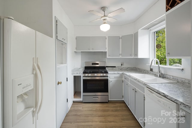 55 Lookout Dr, Asheville, NC 28804 - kitchen featuring white appliances, a ceiling fan, dark wood finished floors, and light countertops