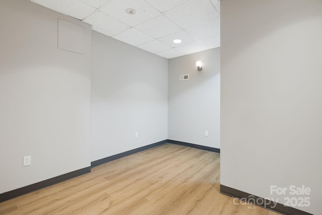55 Lookout Dr, Asheville, NC 28804 - unfurnished room with a drop ceiling, light wood-style flooring, and recessed lighting