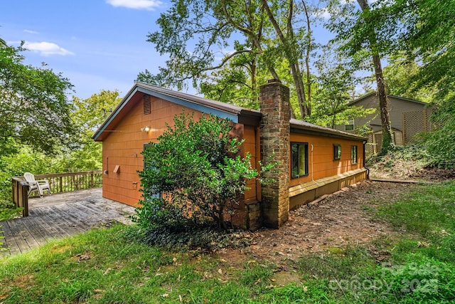 55 Lookout Dr, Asheville, NC 28804 - view of side of home with a deck and a chimney