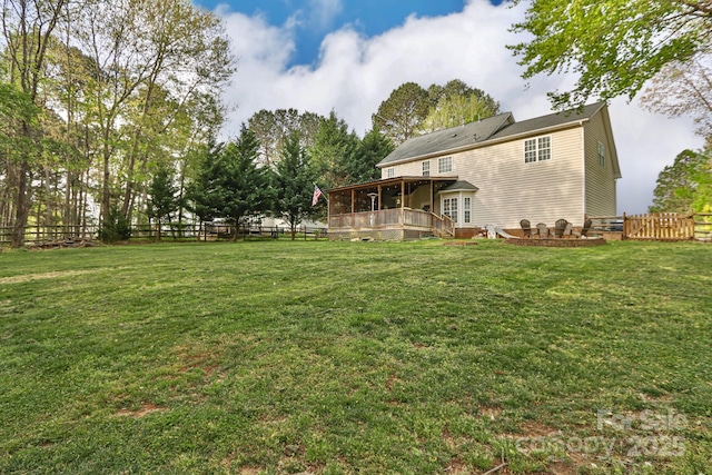 111 Painted Bunting Dr, Troutman, NC 28166 - fenced backyard featuring a deck and a sunroom
