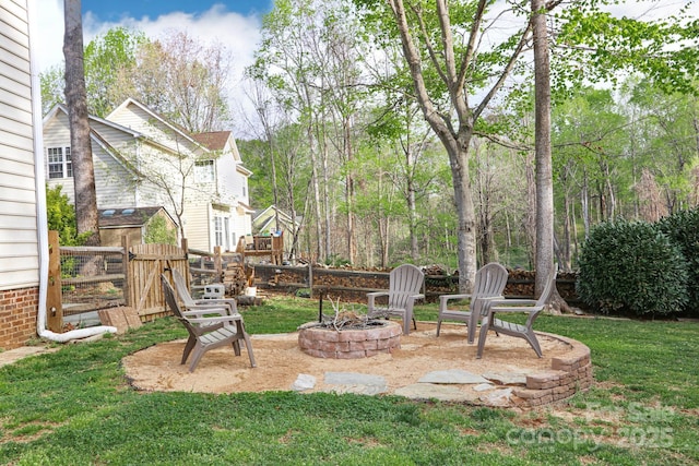 111 Painted Bunting Dr, Troutman, NC 28166 - view of grassy yard featuring an outdoor fire pit