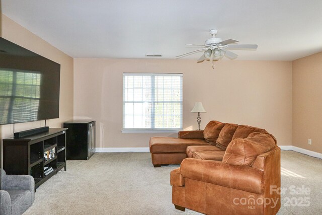 111 Painted Bunting Dr, Troutman, NC 28166 - living area featuring carpet flooring and ceiling fan