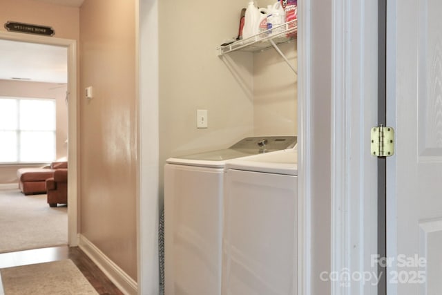 111 Painted Bunting Dr, Troutman, NC 28166 - laundry area featuring separate washer and dryer and baseboards