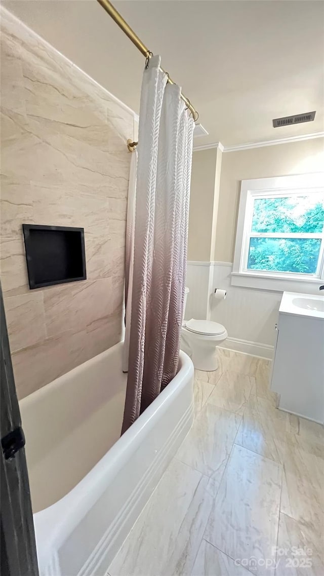 616 W Marion St, Shelby, NC 28150 - full bath featuring crown molding, shower / bath combo with shower curtain, vanity, wainscoting, and marble look tile flooring