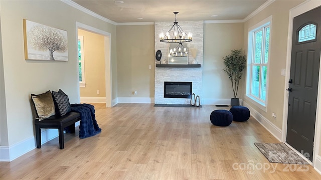 616 W Marion St, Shelby, NC 28150 - entrance foyer with plenty of natural light, light wood-style flooring, a chandelier, and ornamental molding