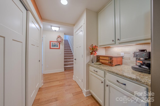 38 Westfield Way, Candler, NC 28715 - hallway featuring light wood-style flooring and stairway