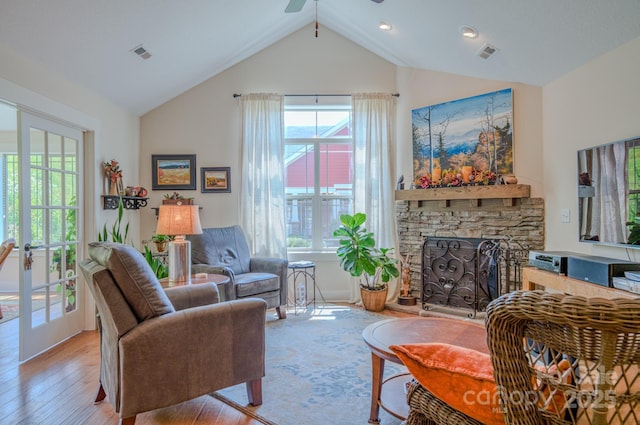 38 Westfield Way, Candler, NC 28715 - living area featuring ceiling fan, wood finished floors, a fireplace, and high vaulted ceiling
