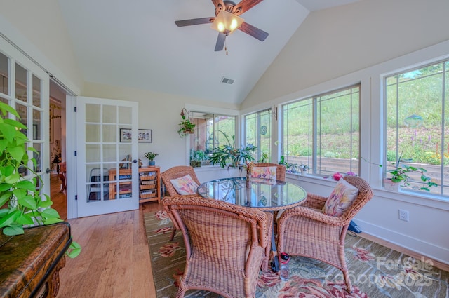 38 Westfield Way, Candler, NC 28715 - sunroom / solarium featuring plenty of natural light, wood finished floors, high vaulted ceiling, and french doors