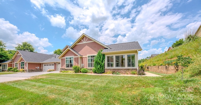 38 Westfield Way, Candler, NC 28715 - craftsman-style home featuring concrete driveway, a front lawn, an attached garage, and stone siding