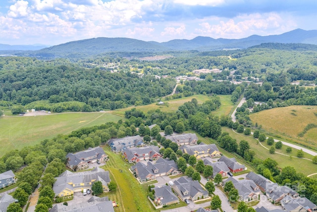 38 Westfield Way, Candler, NC 28715 - aerial perspective of suburban area with a mountainous background and a forest