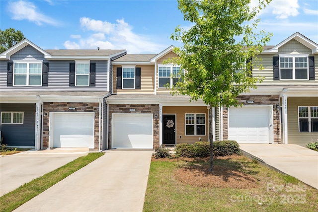 6507 Revolutionary Trl, Charlotte, NC 28217 - view of property with a garage, stone siding, and driveway