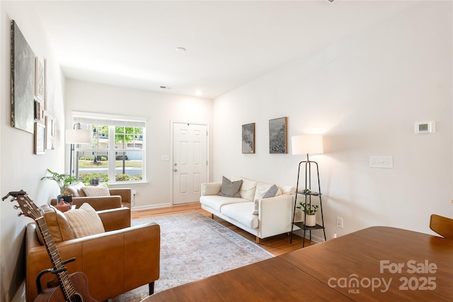 6507 Revolutionary Trl, Charlotte, NC 28217 - living room featuring wood finished floors and baseboards