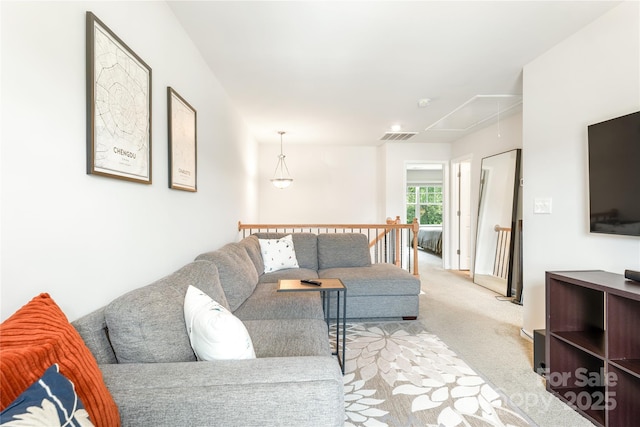 6507 Revolutionary Trl, Charlotte, NC 28217 - carpeted living room featuring attic access