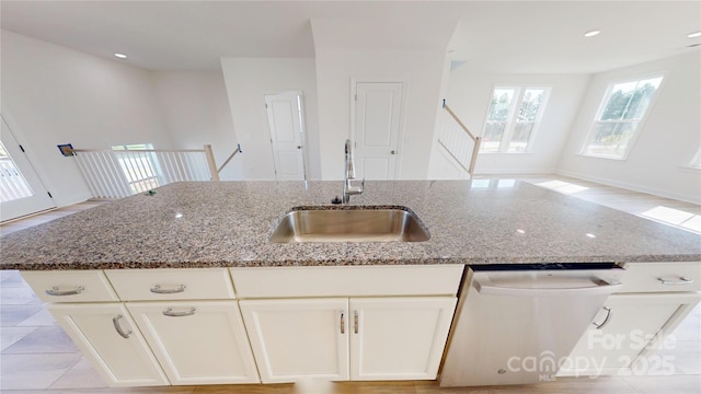 2143 Barrowcliffe Dr NW, Concord, NC 28027 - kitchen featuring dishwasher, stone counters, white cabinetry, and recessed lighting